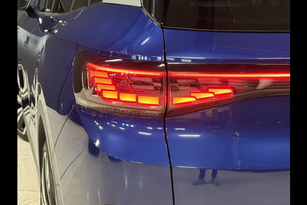 Volkswagen ID.4 First Max 77 kWh | SoH 90% | Panoramakdak | Elek. Trekhaak | Stoel/stuurverw. | ACC | 21''inch | Camera