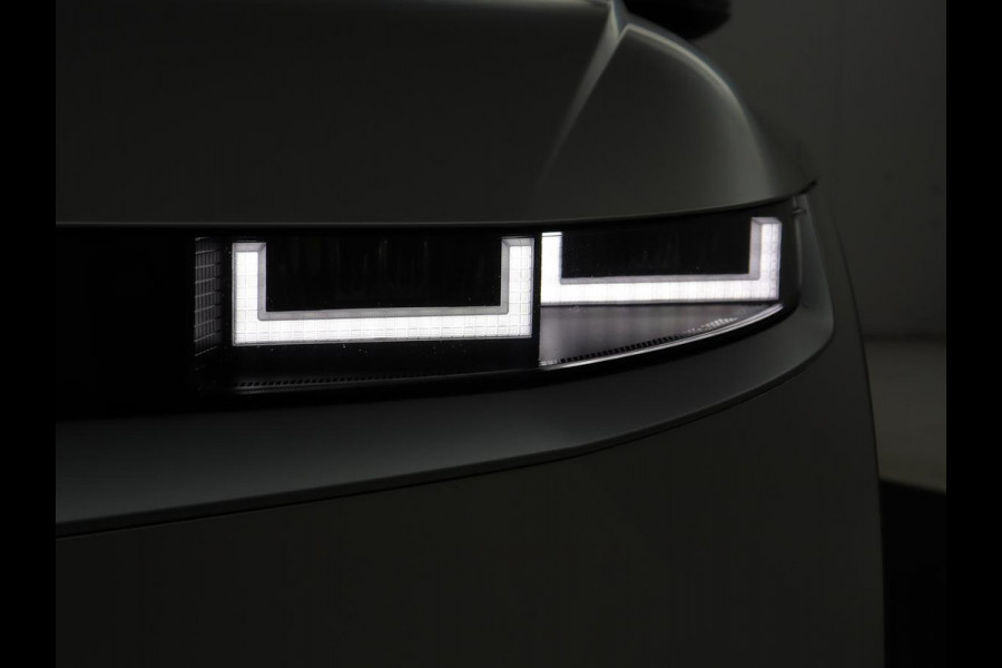 Hyundai IONIQ 5 Connect 58 kWh | SOH 100% | Stoelverwarming | Adaptive cruise | Bose Sound | Camera | Carplay | Half leder | Vehicle-to-load | Keyless | Navigatie | Full LED
