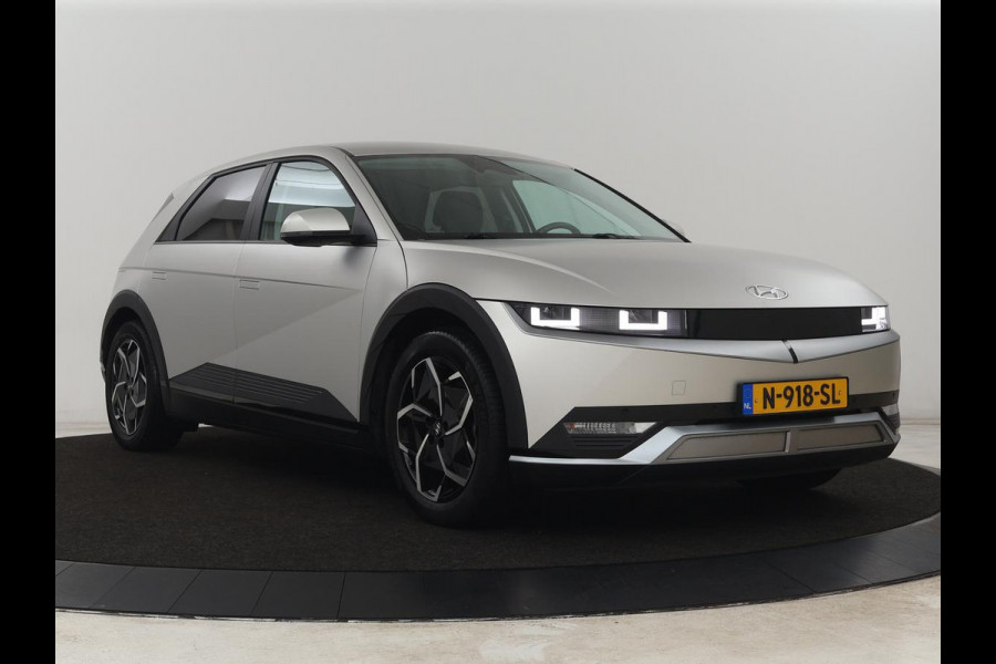 Hyundai IONIQ 5 Connect 58 kWh | SOH 100% | Stoelverwarming | Adaptive cruise | Bose Sound | Camera | Carplay | Half leder | Vehicle-to-load | Keyless | Navigatie | Full LED