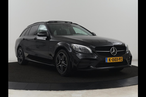 Mercedes-Benz C-Klasse 300e AMG Limited | Panoramadak | 360 Camera | Stoelverwarming | Trekhaak | Carplay | Leder/Alcantara | Sfeerverlichting | Navigatie | Cruise control | Park Assist |