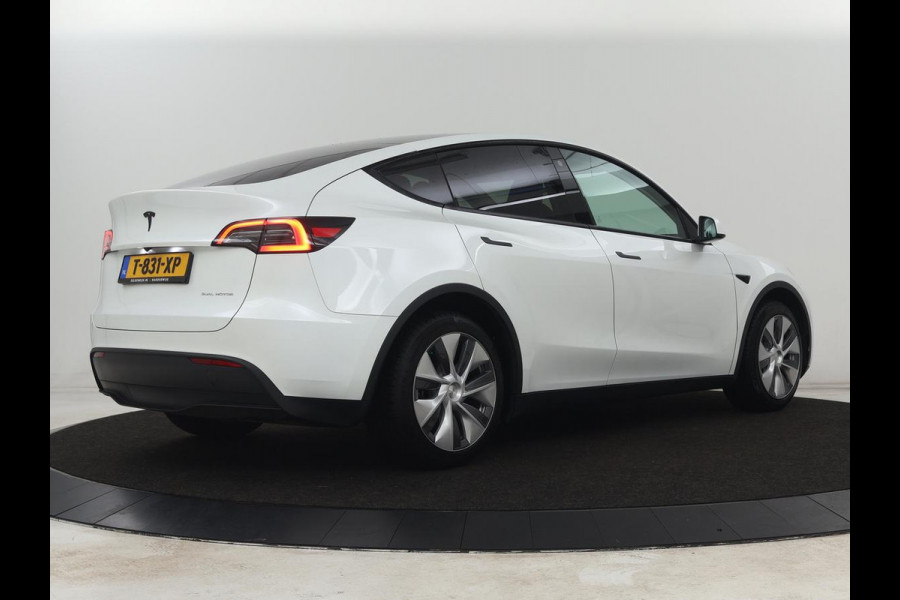 Tesla Model Y Long Range AWD 75 kWh | SOH 94% | Panoramadak | Autopilot | Stoelverwarming | Leder | 360 Camera | Achterbankverwarming | Keyless | Navigatie | Full LED