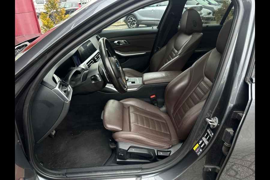 BMW 3 Serie Touring 320e Business Edition Plus | M sport | Pano | HUD | Leder