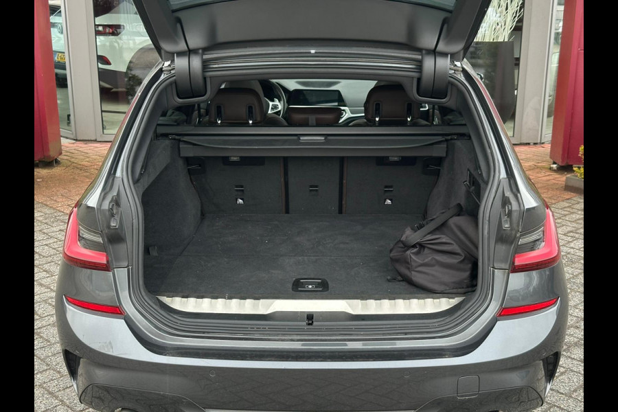BMW 3 Serie Touring 320e Business Edition Plus | M sport | Pano | HUD | Leder