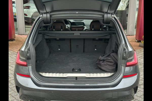 BMW 3 Serie Touring 320e Business Edition Plus | M sport | Pano | HUD | Leder