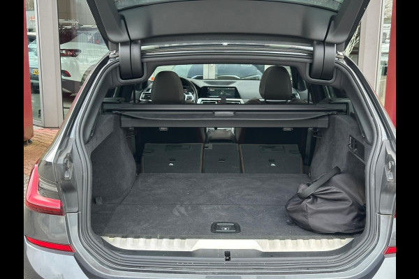 BMW 3 Serie Touring 320e Business Edition Plus | M sport | Pano | HUD | Leder