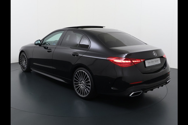 Mercedes-Benz C-Klasse 200 AMG // Panoramadak // Trekhaak // Carplay // Camera // Nightpakket // Alarm // 19 inch // Sfeerverlichting
