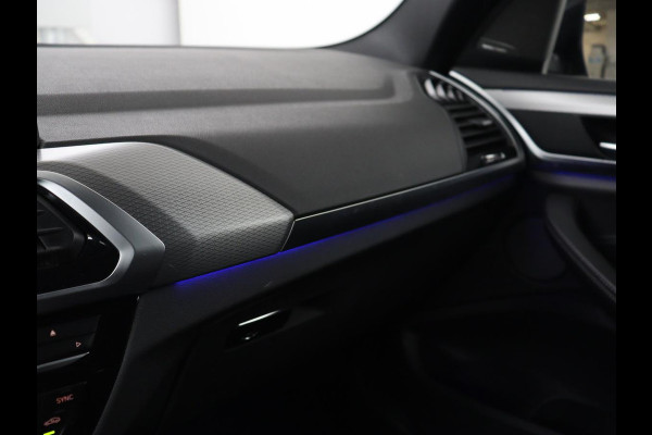 BMW X3 xDrive20i High Executive | M Sport | 1e eigenaar | Head-Up | Leder | Trekhaak | Stoelverwarming | Harman/Kardon | Camera | Keyless | Adaptive Drive | Sfeerverlichting | Full LED | Sportstoelen
