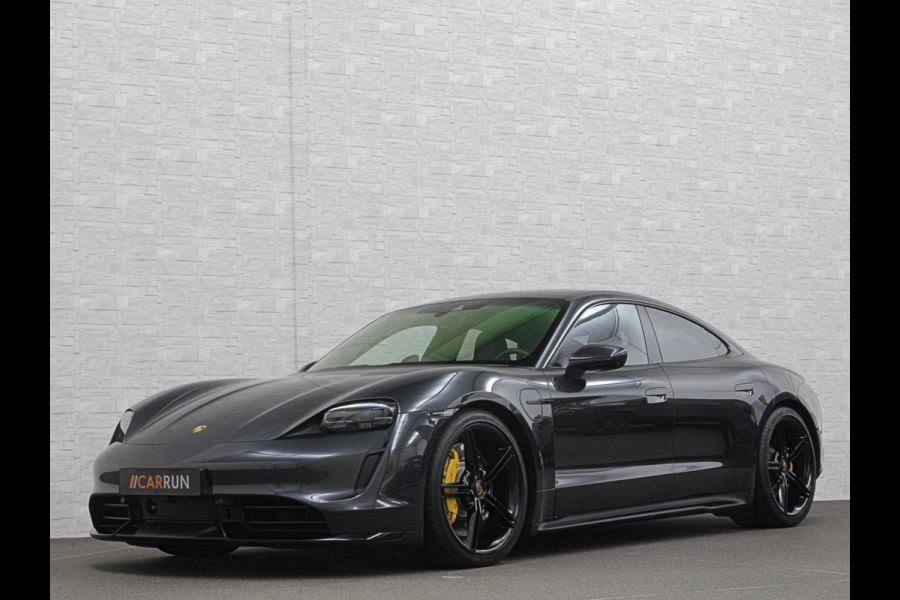 Porsche Taycan 4S Turbo Pakket Performance 84 kWh 490pk | Sport Chrono + | 360 Camera | ACC | Luchtvering | Carbon | 21" | Glasdak | 4WD | Vulkaangrijs | Carplay | Nw.Pr. 147.249,= | NL Auto | SOH Test | Garantie.