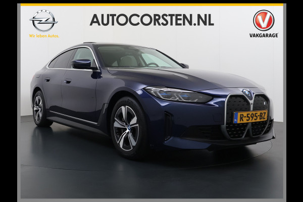 BMW i4 eDrive40 340pk 84kWh Pano-Dak/Hefdak Leer SportSt+Leer+(Stuur+)Verwarmd 360°Camera SOH 99% Adaptive-Cruise+s&go High Executive P Semi-Autopilot Drive-Assist-pro Active-Guard-Plus Elektr.Achterklep Draadl-Lader BAS ESP BMW Individual interieurlijsten Pianolak schwarz BMW Individual Exterieur Line Aluminium satiniert BMW Copilot-pack Dodehoekdetectie/correctie, Kruisend-verkeer-Detectie, rijstrooksensor met correctie, rondomzicht camera, uitwijk assistent) 0-100 5,6 sec. 1600kg trekvermogen! € 73.000 nieuw