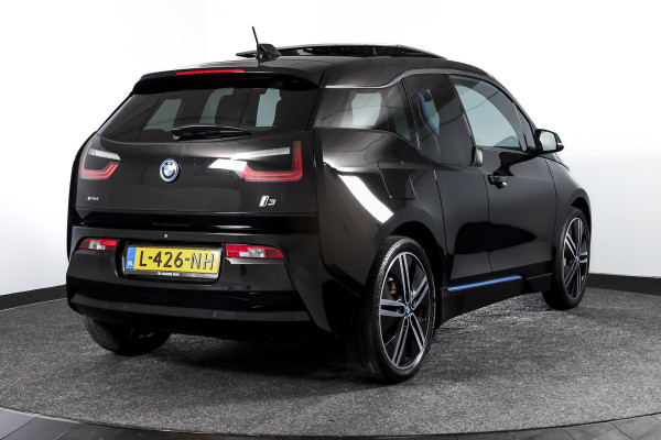 BMW i3 Basis 94Ah 33 kWh | S/k-panodak | Harman/Kardon | Dig. Cockpit | Adapt. cruise | Stoelverw. | PDC | Camera | NAV | ECC | LM 20" |
