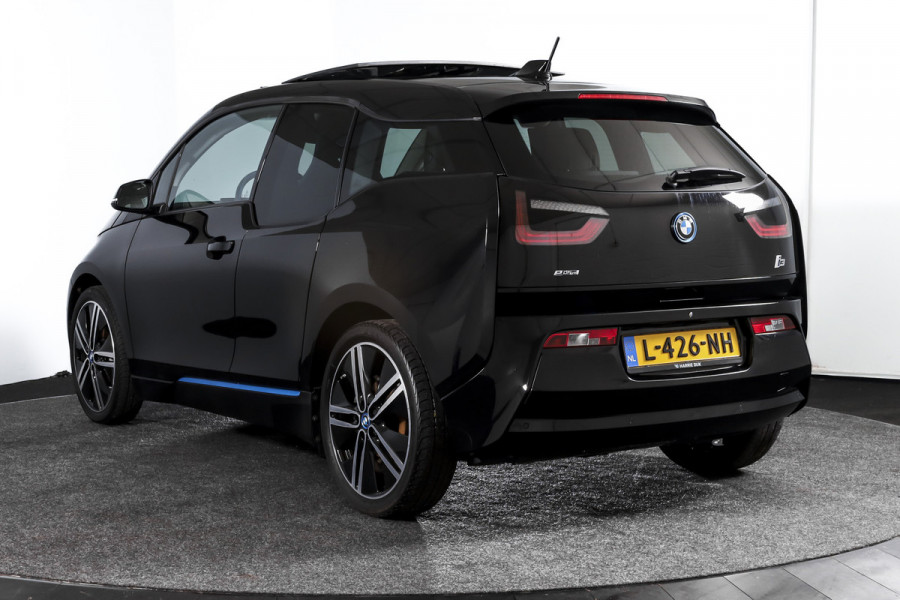 BMW i3 Basis 94Ah 33 kWh | S/k-panodak | Harman/Kardon | Dig. Cockpit | Adapt. cruise | Stoelverw. | PDC | Camera | NAV | ECC | LM 20" |