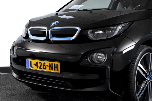 BMW i3 Basis 94Ah 33 kWh | S/k-panodak | Harman/Kardon | Dig. Cockpit | Adapt. cruise | Stoelverw. | PDC | Camera | NAV | ECC | LM 20" |