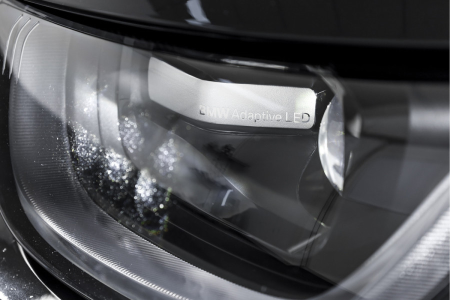 BMW i3 Basis 94Ah 33 kWh | S/k-panodak | Harman/Kardon | Dig. Cockpit | Adapt. cruise | Stoelverw. | PDC | Camera | NAV | ECC | LM 20" |