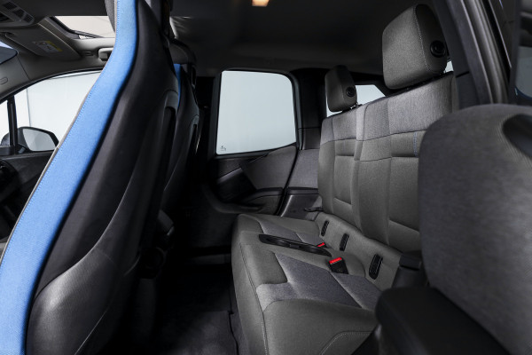 BMW i3 Basis 94Ah 33 kWh | S/k-panodak | Harman/Kardon | Dig. Cockpit | Adapt. cruise | Stoelverw. | PDC | Camera | NAV | ECC | LM 20" |