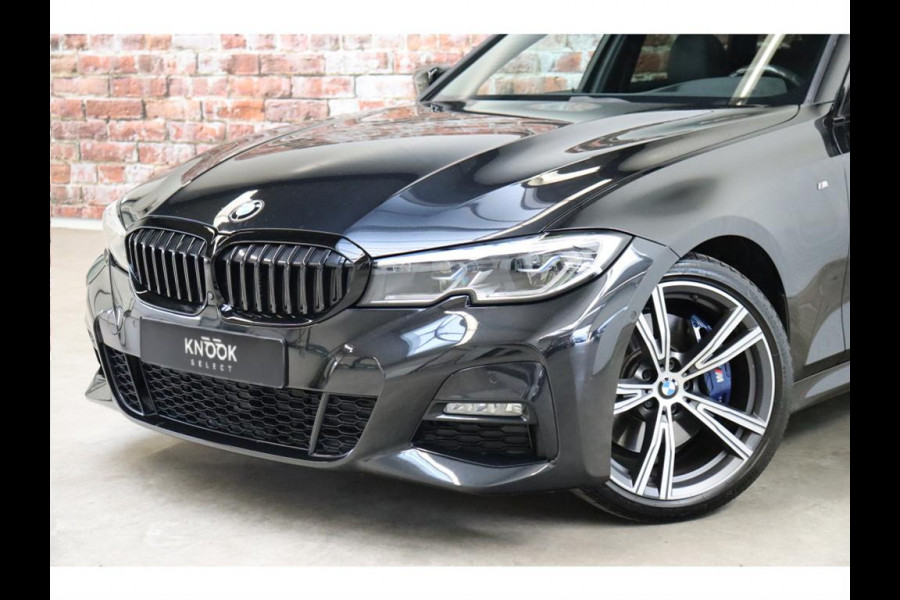 BMW 3 Serie Touring 330i xDrive High Executive M Sport / Panoramadak / Head-Up Display / Trekhaak / Leder / Apple CarPlay / Harman Kardon / 19 Inch /  Laserlicht / M Sportremsysteem / Adaptief M-onderstel