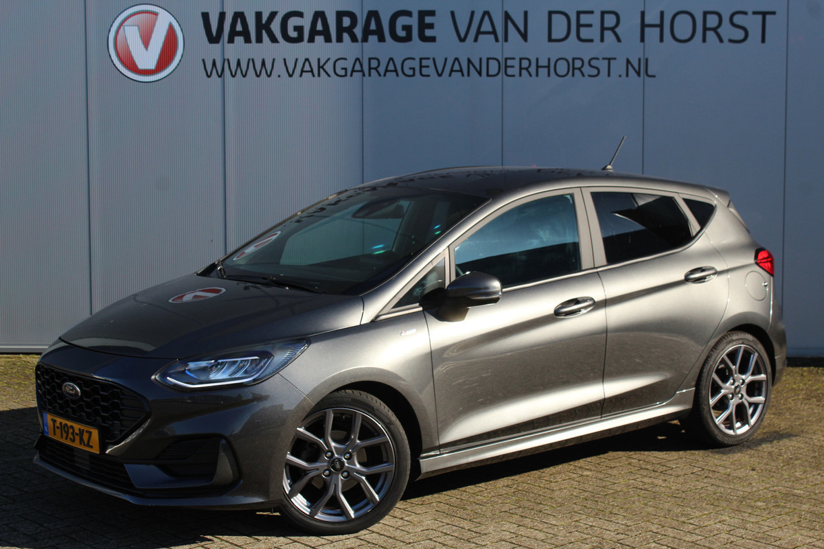 Ford Fiesta 1.0-125pk EcoBoost Mild-Hybrid ST-Line. Luxe, sportieve en goed onderhouden Fiesta ! Autm. airco, Cruise control, Lane assist, 17" Lmv, Parkeersensoren Achter, Metallic lak, Navigatie by Apple/Android, LED verlichting etc.