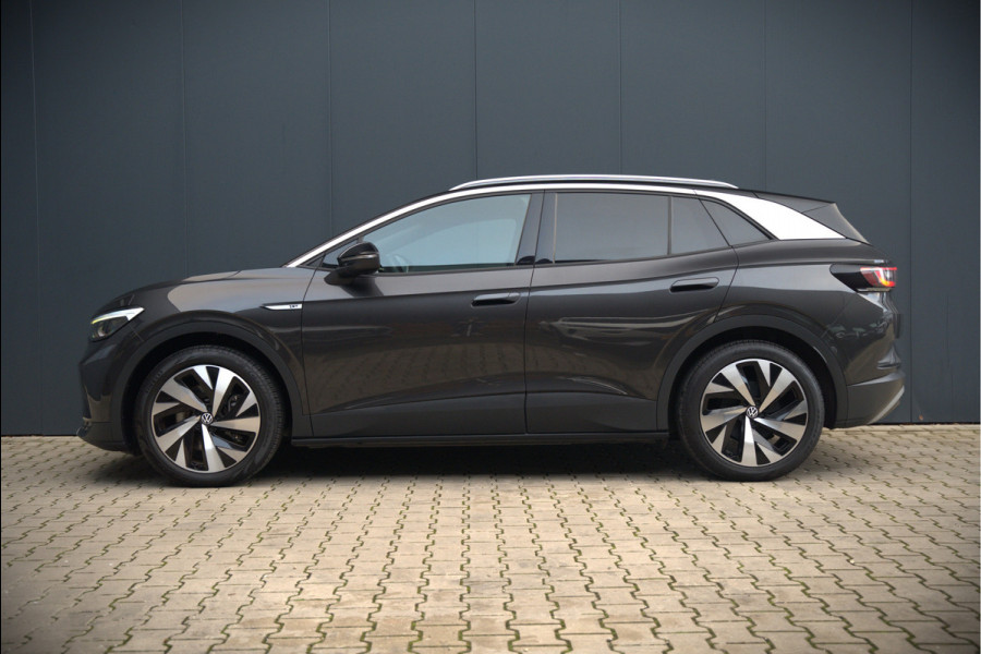 Volkswagen ID.4 First 77 kWh | Stoelverwarming | Stuurverwarming | Trekhaak | Adaptive Cruise Control | Navigatie | Apple Carplay | Keyless | Camera | Parkersensoren |