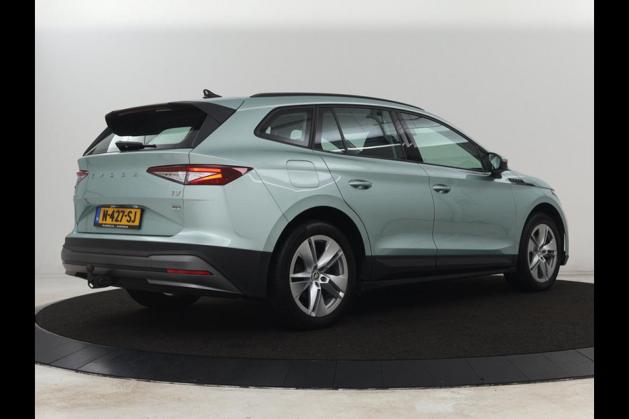 Škoda ENYAQ iV 60 | Trekhaak | Carplay | Camera | Half leder | Navigatie | Parkeerhulp | Sfeerverlichting | Cruise control | Full LED | 19'' | Climate control