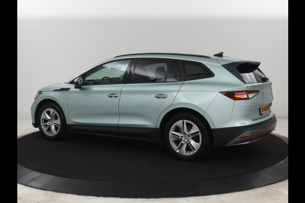 Škoda ENYAQ iV 60 | Warmtepomp | Stoelverwarming | Camera | Keyless | Carplay | Navigatie | Half leder | Full LED | Cruise control | Parkeerhulp | Sfeerverlichting