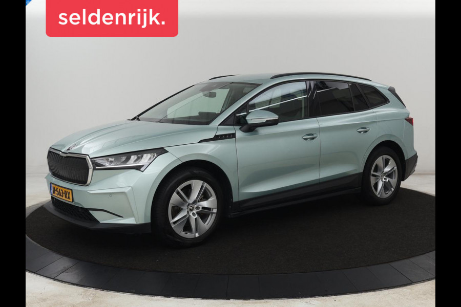 Škoda ENYAQ iV 60 | Warmtepomp | Stoelverwarming | Camera | Keyless | Carplay | Navigatie | Half leder | Full LED | Cruise control | Parkeerhulp | Sfeerverlichting