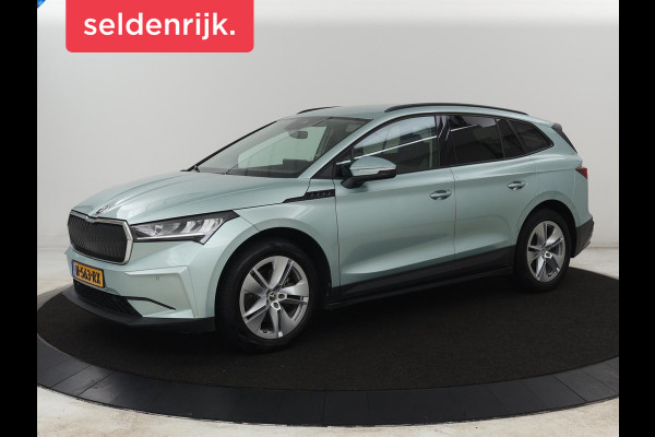 Škoda ENYAQ iV 60 | Warmtepomp | Stoelverwarming | Camera | Keyless | Carplay | Navigatie | Half leder | Full LED | Cruise control | Parkeerhulp | Sfeerverlichting