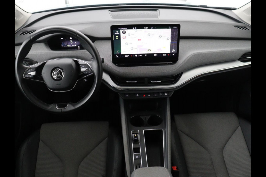 Škoda ENYAQ iV 60 | Warmtepomp | Stoelverwarming | Camera | Keyless | Carplay | Navigatie | Half leder | Full LED | Cruise control | Parkeerhulp | Sfeerverlichting