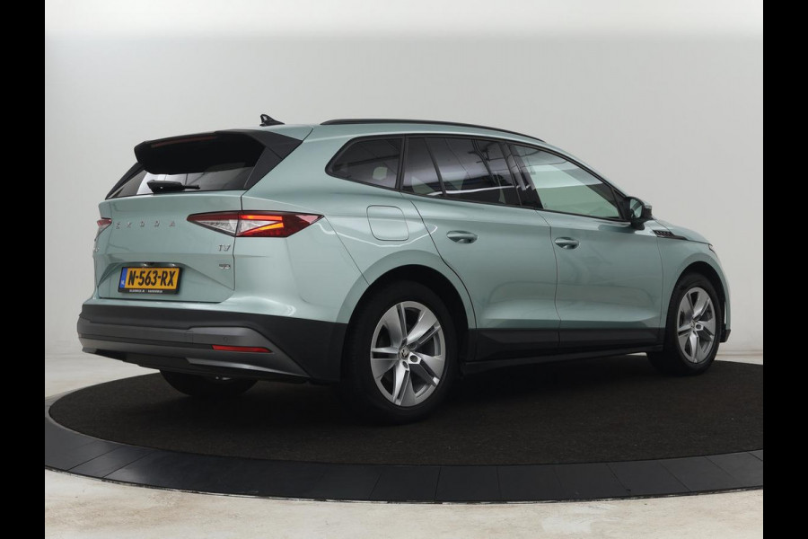 Škoda ENYAQ iV 60 | Warmtepomp | Stoelverwarming | Camera | Keyless | Carplay | Navigatie | Half leder | Full LED | Cruise control | Parkeerhulp | Sfeerverlichting