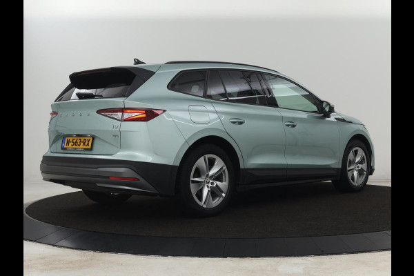 Škoda ENYAQ iV 60 | Warmtepomp | Stoelverwarming | Camera | Keyless | Carplay | Navigatie | Half leder | Full LED | Cruise control | Parkeerhulp | Sfeerverlichting