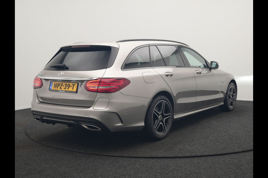 Mercedes-Benz C-Klasse Estate 300 e Business Solution AMG PHEV 320pk | Trekhaak af Fabriek | Adaptive Cruise | Alcantara Sportstoelen Verwarmd | Apple Carplay | Camera | BLIS | 18"L.M | Plug In Hybrid