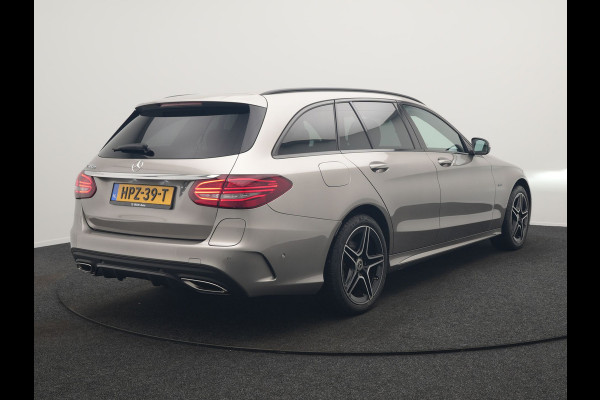 Mercedes-Benz C-Klasse Estate 300 e Business Solution AMG PHEV 320pk | Trekhaak af Fabriek | Adaptive Cruise | Alcantara Sportstoelen Verwarmd | Apple Carplay | Camera | BLIS | 18"L.M | Plug In Hybrid