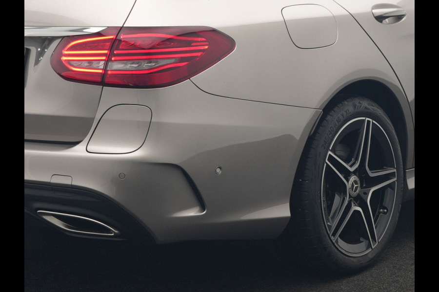 Mercedes-Benz C-Klasse Estate 300 e Business Solution AMG PHEV 320pk | Trekhaak af Fabriek | Adaptive Cruise | Alcantara Sportstoelen Verwarmd | Apple Carplay | Camera | BLIS | 18"L.M | Plug In Hybrid