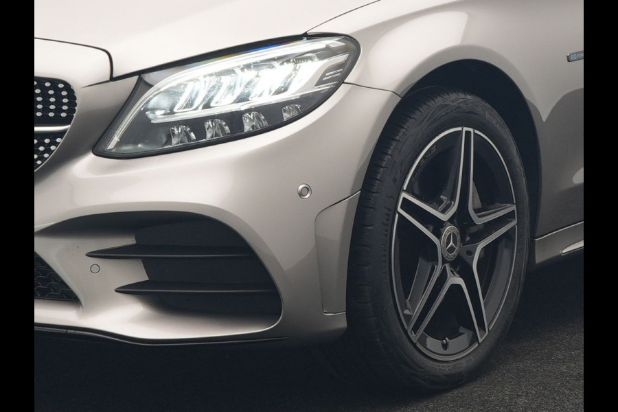 Mercedes-Benz C-Klasse Estate 300 e Business Solution AMG PHEV 320pk | Trekhaak af Fabriek | Adaptive Cruise | Alcantara Sportstoelen Verwarmd | Apple Carplay | Camera | BLIS | 18"L.M | Plug In Hybrid