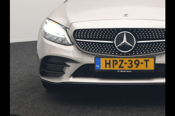 Mercedes-Benz C-Klasse Estate 300 e Business Solution AMG PHEV 320pk | Trekhaak af Fabriek | Adaptive Cruise | Alcantara Sportstoelen Verwarmd | Apple Carplay | Camera | BLIS | 18"L.M | Plug In Hybrid