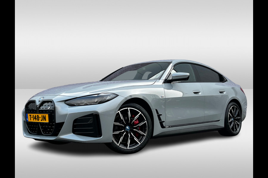 BMW i4 eDrive40 High Executive 84 kWh / Trekhaak / 360Camera / Head-up / Leder / 19'' / Navigatie / Stoelverwarming / DAB / Cruise Control