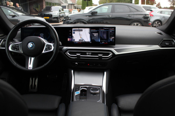 BMW i4 eDrive40 High Executive 84 kWh / Trekhaak / 360Camera / Head-up / Leder / 19'' / Navigatie / Stoelverwarming / DAB / Cruise Control