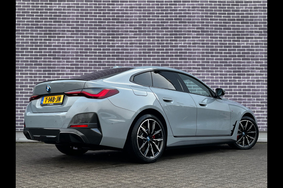 BMW i4 eDrive40 High Executive 84 kWh / Trekhaak / 360Camera / Head-up / Leder / 19'' / Navigatie / Stoelverwarming / DAB / Cruise Control