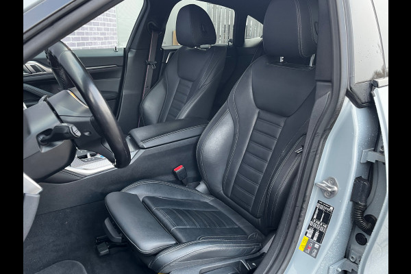 BMW i4 eDrive40 High Executive 84 kWh / Trekhaak / 360Camera / Head-up / Leder / 19'' / Navigatie / Stoelverwarming / DAB / Cruise Control