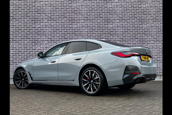 BMW i4 eDrive40 High Executive 84 kWh / Trekhaak / 360Camera / Head-up / Leder / 19'' / Navigatie / Stoelverwarming / DAB / Cruise Control