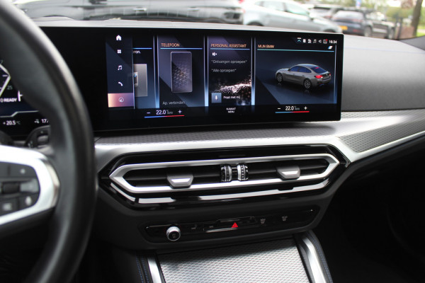 BMW i4 eDrive40 High Executive 84 kWh / Trekhaak / 360Camera / Head-up / Leder / 19'' / Navigatie / Stoelverwarming / DAB / Cruise Control