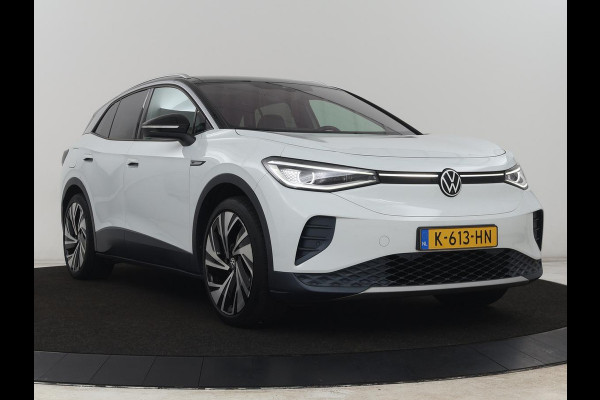Volkswagen ID.4 First Max 77 kWh | Panoramadak | Head-Up | 360 Camera | Stoelverwarming | Matrix LED | Sfeerverlichting | Keyless | Adaptive cruise | Navigatie | Carplay | Half leder | Memory