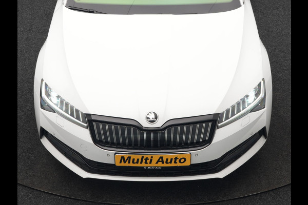 Škoda Superb Combi 1.4 TSI iV Sportline Business Plug In Hybrid 218pk PHEV | Panodak | Adaptive Cruise | Camera | Canton Audio | Alcantara Sportstoelen Memory & Verwarmd | Sfeerverlichting | Apple Carplay | Crystal LED | Stuur Verwarmd | Navigatie | DAB |