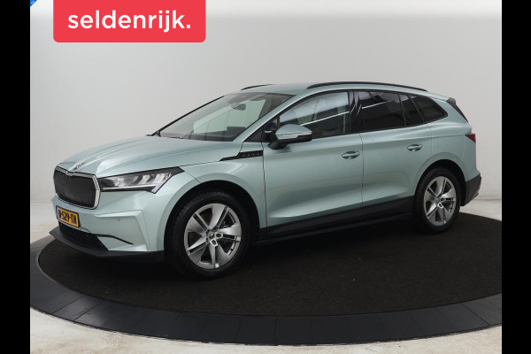 Škoda ENYAQ iV 60 | SOH 91% | Trekhaak | Stoelverwarming | Camera | Sportstuur | Carplay | Navigatie | Cruise control | Full LED | Half leder | DAB | Parkeerhulp | Sfeerverlichting | Climate control