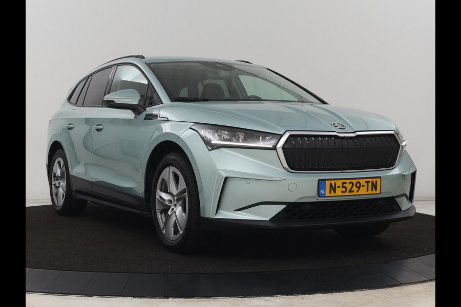 Škoda ENYAQ iV 60 | SOH 91% | Trekhaak | Stoelverwarming | Camera | Sportstuur | Carplay | Navigatie | Cruise control | Full LED | Half leder | DAB | Parkeerhulp | Sfeerverlichting | Climate control