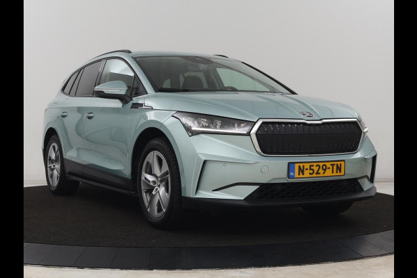 Škoda ENYAQ iV 60 | SOH 91% | Trekhaak | Stoelverwarming | Camera | Sportstuur | Carplay | Navigatie | Cruise control | Full LED | Half leder | DAB | Parkeerhulp | Sfeerverlichting | Climate control