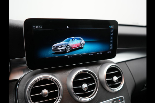 Mercedes-Benz C-Klasse Estate 300 e Business Solution AMG PHEV 320pk | Trekhaak af Fabriek | Adaptive Cruise | Alcantara Sportstoelen Verwarmd | Apple Carplay | Camera | BLIS | 18"L.M | Plug In Hybrid
