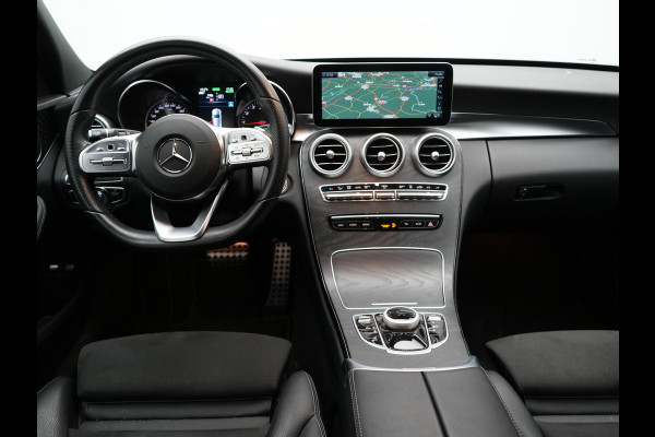 Mercedes-Benz C-Klasse Estate 300 e Business Solution AMG PHEV 320pk | Trekhaak af Fabriek | Adaptive Cruise | Alcantara Sportstoelen Verwarmd | Apple Carplay | Camera | BLIS | 18"L.M | Plug In Hybrid