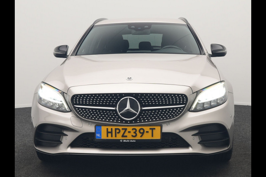 Mercedes-Benz C-Klasse Estate 300 e Business Solution AMG PHEV 320pk | Trekhaak af Fabriek | Adaptive Cruise | Alcantara Sportstoelen Verwarmd | Apple Carplay | Camera | BLIS | 18"L.M | Plug In Hybrid