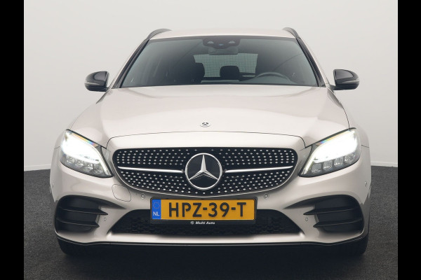 Mercedes-Benz C-Klasse Estate 300 e Business Solution AMG PHEV 320pk | Trekhaak af Fabriek | Adaptive Cruise | Alcantara Sportstoelen Verwarmd | Apple Carplay | Camera | BLIS | 18"L.M | Plug In Hybrid