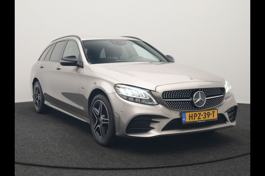 Mercedes-Benz C-Klasse Estate 300 e Business Solution AMG PHEV 320pk | Trekhaak af Fabriek | Adaptive Cruise | Alcantara Sportstoelen Verwarmd | Apple Carplay | Camera | BLIS | 18"L.M | Plug In Hybrid