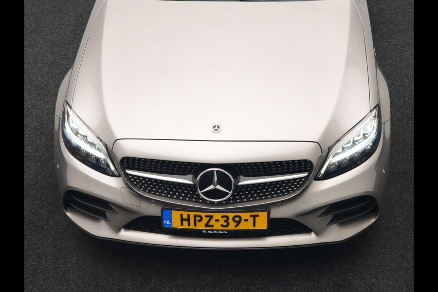 Mercedes-Benz C-Klasse Estate 300 e Business Solution AMG PHEV 320pk | Trekhaak af Fabriek | Adaptive Cruise | Alcantara Sportstoelen Verwarmd | Apple Carplay | Camera | BLIS | 18"L.M | Plug In Hybrid